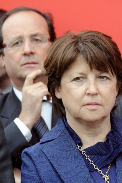 Martine Aubry y François Hollande, en un acto del PS en 2009.