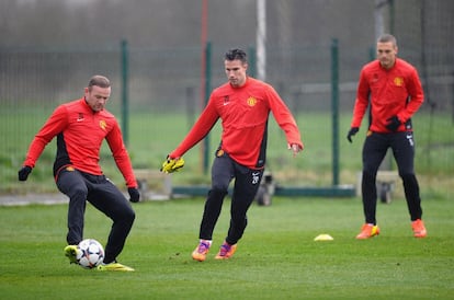 Rooney y Van Persie en el entrenamiento en Carrington (Manchester).