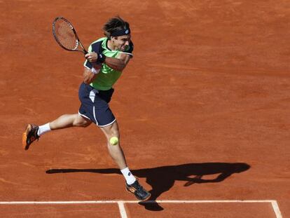 Ferrer golpea ante Robredo.