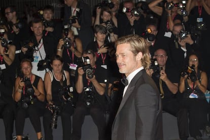 Brad Pitt, ayer, en el Festival de Cine de Venecia, posando ante los fotógrafos.