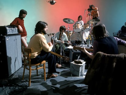 The Beatles, in the studio during the recording of 'Let It Be,' in January 1968, in a photo by Ethan A. Russell.