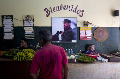 Vendors wait for customers at a market in Old Havana, Cuba.