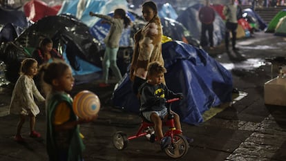 Migrant children camp with their families waiting for an appointment through the U.S. Customs and Border Protection app, called CBP ONE, in Mexico City, Mexico November 23, 2023.