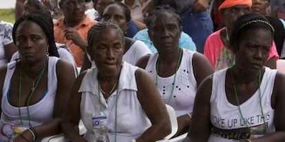 FARC victims attend a ceremony in Bojayá, Chocó, Colombia, where the guerrilla rebels publicly asked for forgiveness on December 5.