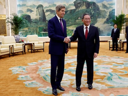 U.S. Special Presidential Envoy for Climate John Kerry and Chinese Premier Li Qiang shake hands before a meeting at the Great Hall of the People in Beijing, China, on July 18, 2023.
