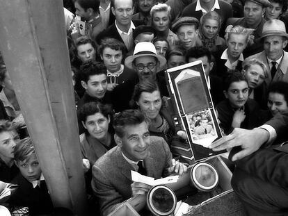 Leonard Bernstein (below, at center), during a meet-and-greet in Moscow, August 1959.