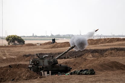 Israeli artillery fires near Israel's border with the Gaza Strip, in southern Israel, October 13, 2023. 