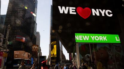 The controversial new logo on display in Times Square.