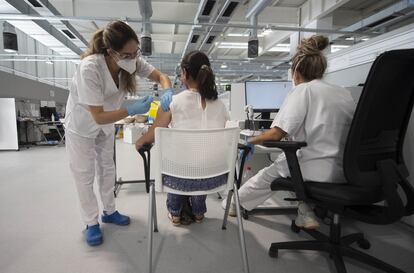 A Covid-19 vaccine is administered this week in Madrid's Zendal Hospital.