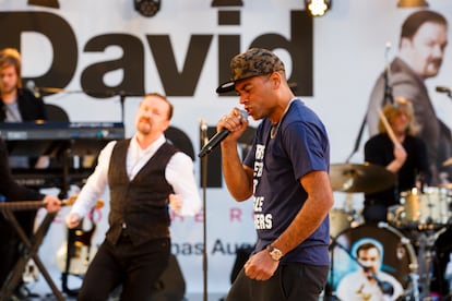 Ben Bailey Smith sings with Ricky Gervais in the premier of 'David Brent: Life On The Road' in London in 2016. 