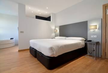 Una de las habitaciones del hotel uVe Alcobendas.