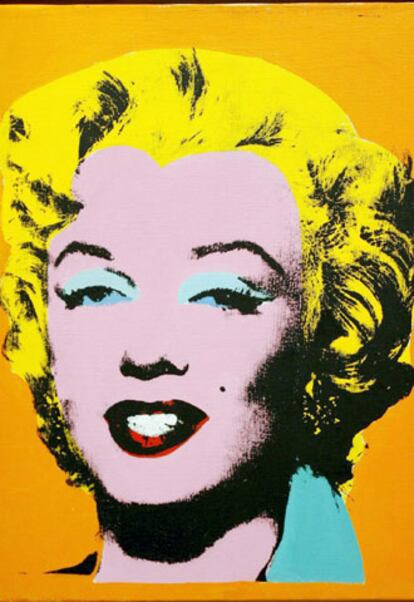 Imagen del cuadro <i>Orange Marilyn</i> de Andy Warhol tomada durante una exposición previa a la subasta de arte posbélico y contemporáneo en la casa de subastas Christie&#39;s en Nueva York. Se espera que el cuadro alcance un precio de venta mínimo aproximado de 10-15 millones de dólares.