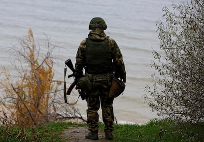A Russian soldier, facing the Dnipro River, in late November. 