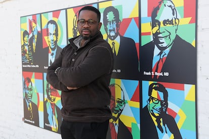 Devon Henry poses at the Sarah Garland Jones Civic Center in Richmond. Henry is the only contractor who dared to accept the commission to remove the racist statues. He had to work with a bulletproof vest.