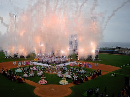 Dancers performs during the Alba Games opening ceremony at the baseball stadium in La Guaira, Venezuela, Friday, April 21, 2023.