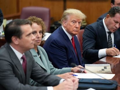 Former President Donald Trump sits at the defense table with his legal team in a Manhattan court, on April 4, 2023, in New York.