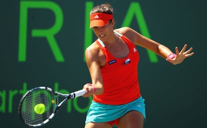 Garbi&ntilde;e Muguruza Blanco of Spain in action against Vera Zvonareva at the Sony Ericsson Open. 