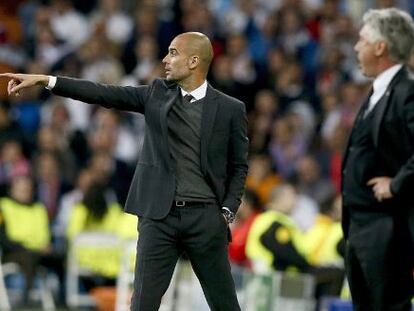 El entrenador del Bayern de Múnich, Josep Guardiola, y el técnico italiano del Real Madrid, Carlo Ancelotti.