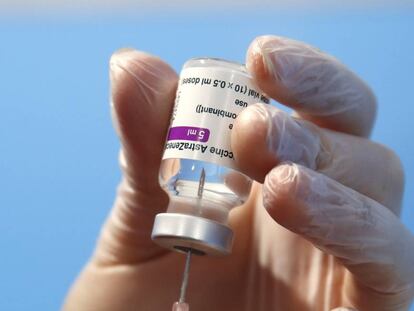 A health worker prepares a dose of the AstraZeneca vaccine to be administered at a vaccination center set up in Fiumicino, near Rome's international airport, Thursday, Feb. 11, 2021. AstraZeneca is of the three vaccines authorized by the European Medicines Agency for use in the 27-nation bloc, the other two are Pfizer-BioNtech and Moderna. (AP Photo/Alessandra Tarantino)