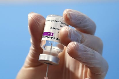 A health worker prepares a dose of the AstraZeneca vaccine to be administered at a vaccination center set up in Fiumicino, near Rome's international airport, Thursday, Feb. 11, 2021. AstraZeneca is of the three vaccines authorized by the European Medicines Agency for use in the 27-nation bloc, the other two are Pfizer-BioNtech and Moderna. (AP Photo/Alessandra Tarantino)