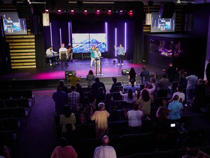 Pastor Jaro Medina in front of members of his congregation at a service on Sunday, April 14 in Chicago.