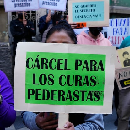 People protest with signs that read in Spanish "Prison for pedophile priests" outside the Bolivian Archbishopric office in La Paz, Bolivia, Friday, May 19, 2023. Milton Murillo, a Bolivian priest, has been remanded in custody on suspicion of abusing seminarians a decade ago, shortly after news broke of what has turned out to be the largest pedophilia scandal in the Andean country’s history, involving the deceased Jesuit priest. (AP Photo/Juan Karita)