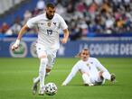 France's forward Karim Benzema (L) drives the ball during the friendly football match France vs Bulgaria ahead of the Euro 2020 tournament, at Stade De France in Saint-Denis, on the outskirts of Paris on June 8, 2021. (Photo by FRANCK FIFE / AFP)