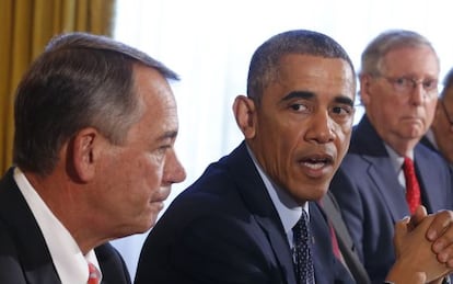 Obama entre os dois futuros líderes do Congresso.