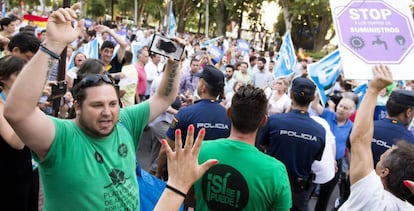 Protesta de miembros de la PAH en el mitin de Rajoy de este jueves.