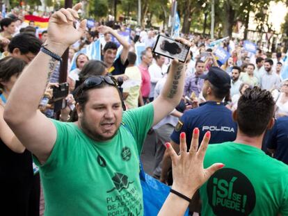 Protesta de miembros de la PAH en el mitin de Rajoy de este jueves.