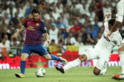 Messi y Khedira, en un partido de la Supercopa.