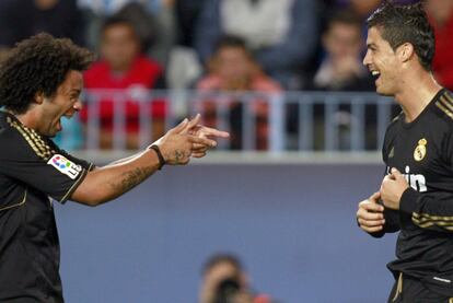 Marcelo y Ronaldo celebran con un baile uno de los goles del portugués.