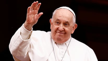 Pope Francis gestures as he delivers his traditional Christmas Day Urbi et Orbi message to the city and the world from the main balcony of St. Peter's Basilica at the Vatican, December 25, 2023.