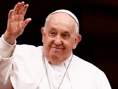 Pope Francis gestures as he delivers his traditional Christmas Day Urbi et Orbi message to the city and the world from the main balcony of St. Peter's Basilica at the Vatican, December 25, 2023.