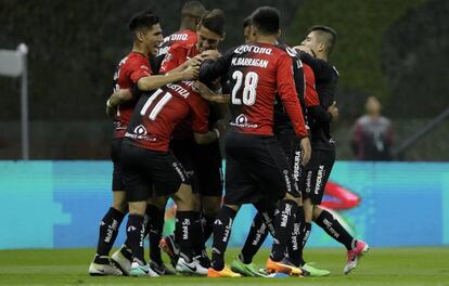 Los jugadores de Atlas durante el partido contra América