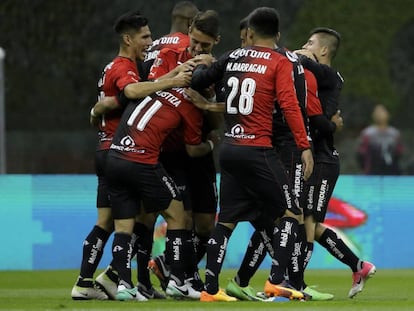 Los jugadores de Atlas durante el partido contra América