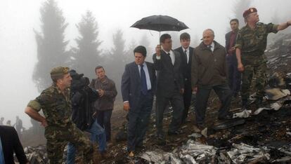 Former Spanish Defense Minister Federico Trillo (in blue jacket) at the site of the accident in 2003.