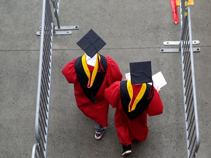 New graduates walk into the High Point Solutions Stadium before the start of the Rutgers University graduation ceremony in Piscataway Township, N.J., on May 13, 2018.