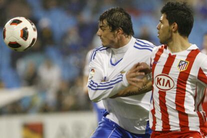 Agüero y Contini, durante el partido