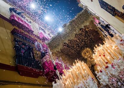 ‘La Esperanza de Triana’ religious brotherhood under their penitence platform, walking through the streets of the Andalusian capital, during ‘la madrugá,’ (the dawn), which is the high point of the processions in Seville, starting a little after midnight into Good Friday, and sometimes lasting until midday.