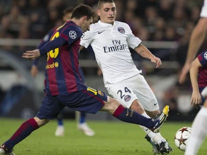 Messi trata de tapar a Verratti, durante un duelo de diciembre.