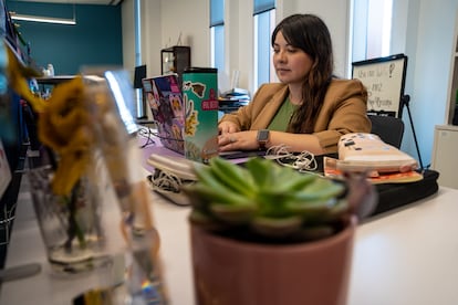 Reyna Montoya works in her office at the Aliento foundation.