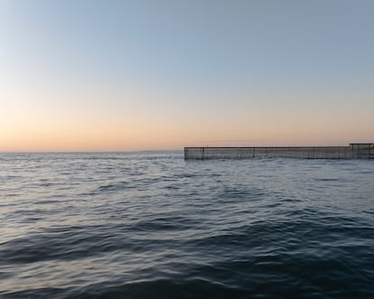 The Wall of Shame, seen from Tijuana, Mexico, extends into the Pacific Ocean.