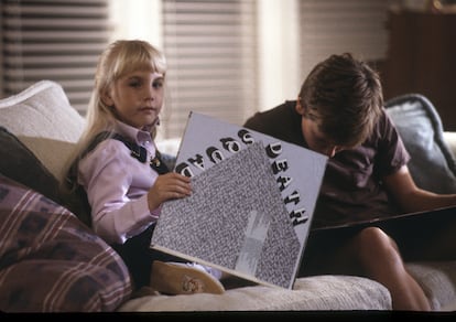 This image of Heather O'Rourke and River Phoenix in a scene from a 1985 TV movie wouldn't have much relevance if it weren't for the tragic fate that befell both of them and because they were playing a game called 'Death Squad.'
