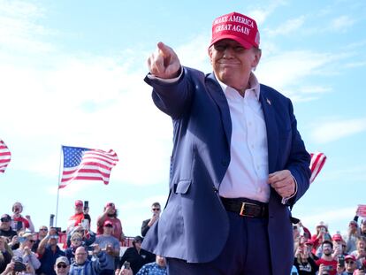 Republican presidential candidate former President Donald Trump gestures to the crowd at a campaign rally Saturday, March 16, 2024, in Vandalia, Ohio. (AP Photo/Jeff Dean)