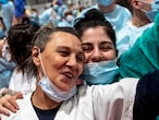 Healthcare workers celebrate and and covid patients the last tribute at the IFEMA field hospital in Madrid, April 30, 2020. Tomorrow it will be officially closed.