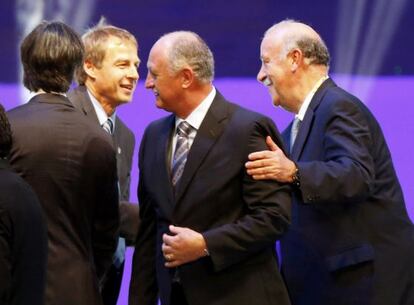 Os treinadores Klinnsman, Scolari e Del Bosque.