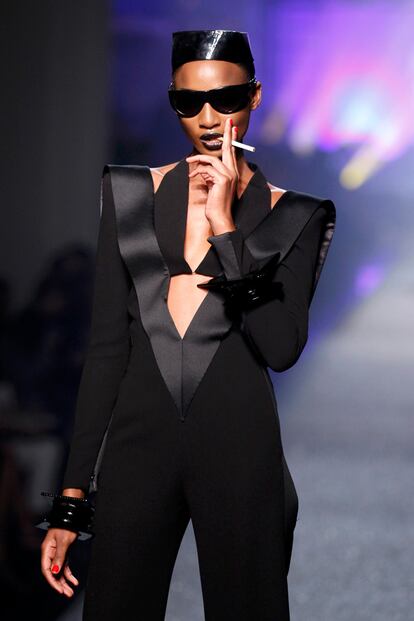 A model presents a creation by French designer Jean Paul Gaultier as part of his Spring/Summer 2013 women's ready-to-wear fashion show during Paris fashion week