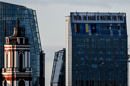 A building in Vilnius with the message: 'Putin, The Hague is waiting for you' — in reference to the international tribunal that has issued an arrest warrant against the Russian president for war crimes.