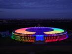 Berlin (Germany), 23/06/2021.- The Olympic Stadium is illuminated in rainbow colors on the occasion of the UEFA EURO 2020 group F preliminary round soccer match between Germany and Hungary taking place in Munich at the same time, in Berlin, Germany, 23 June 2021. The UEFA on 22 June 2021 turned down a request by the city of Munich to illuminate the Allianz Arena in rainbow colors for the UEFA EURO 2020 group stage match between Germany and Hungary on 23 June. The move was seen as a protest against a new law in Hungary that bans sharing content to under-18s which is considered by the government to be promoting homosexuality or gender change. Various sports stadiums over Germany are illuminated in rainbow colors as a gesture of solidarity. (Protestas, Alemania, Hungría) EFE/EPA/CLEMENS BILAN